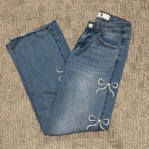 Stylish Blue Jeans with Bow Accents